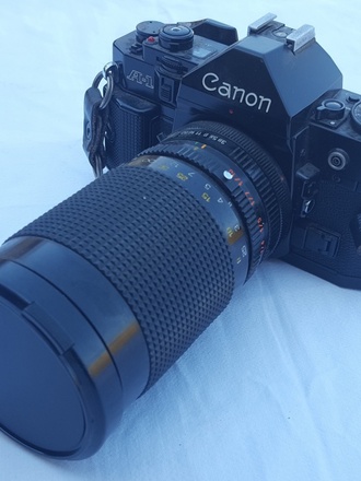 Canon A1 Reflex con teleobiettivo