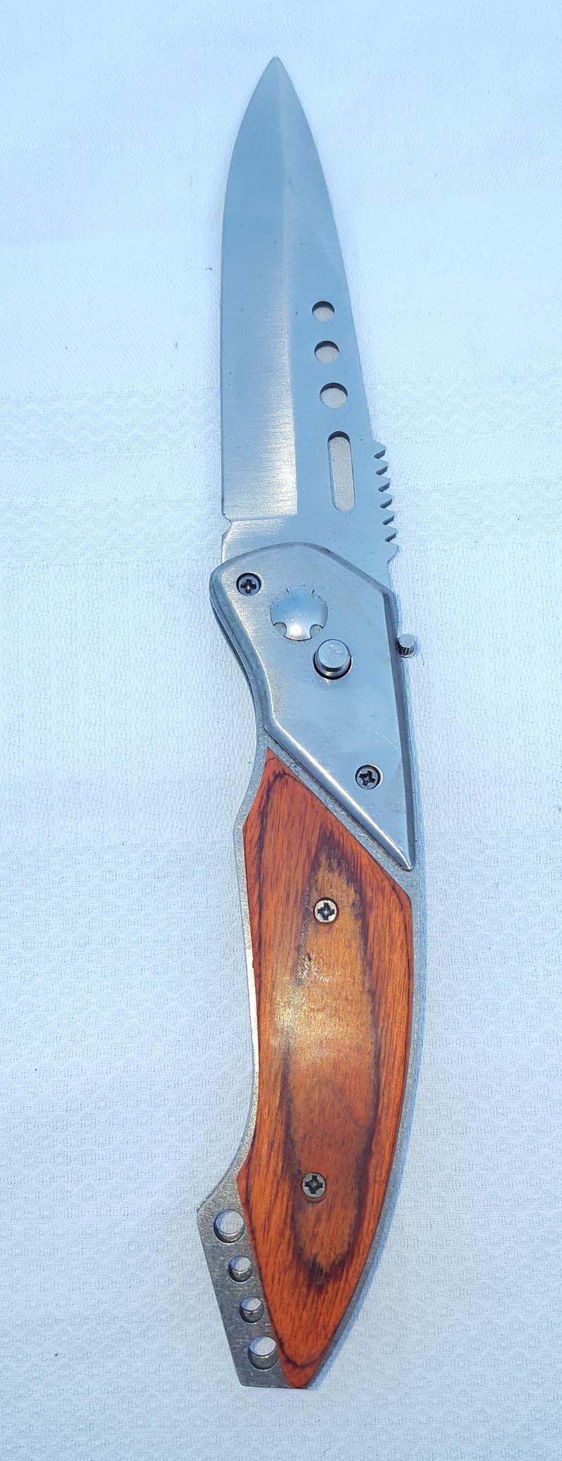 Coltello ad apertura meccanica